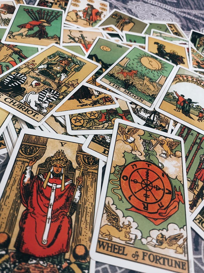 A wide spread of tarot cards offering vivid imagery for a spiritual reading.